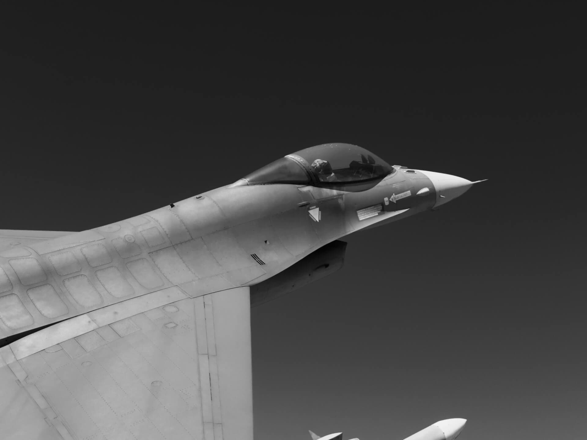 Fighter jet cockpit close-up in black and white
