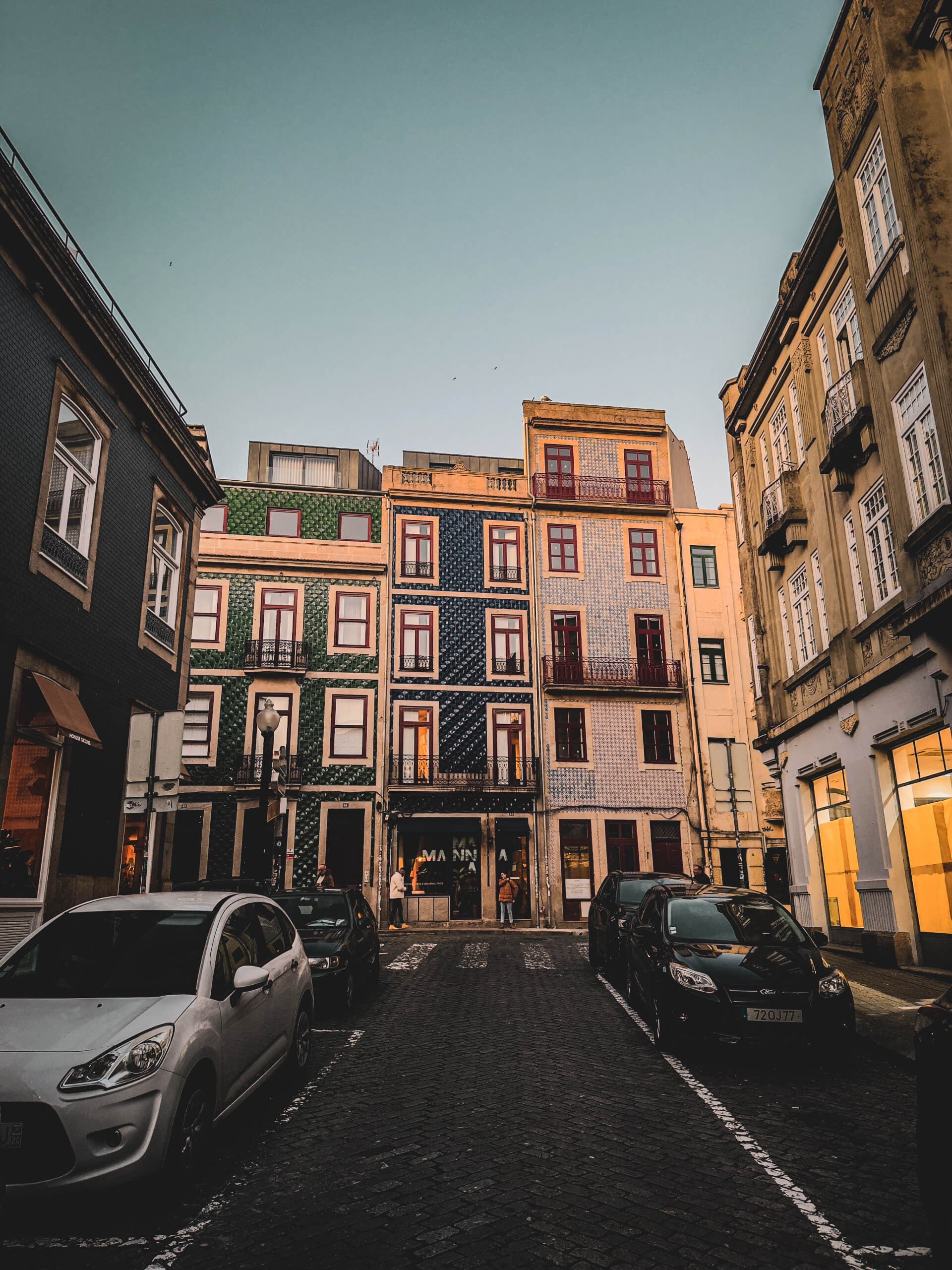 Colorful traditional tiled facades on a Porto street
